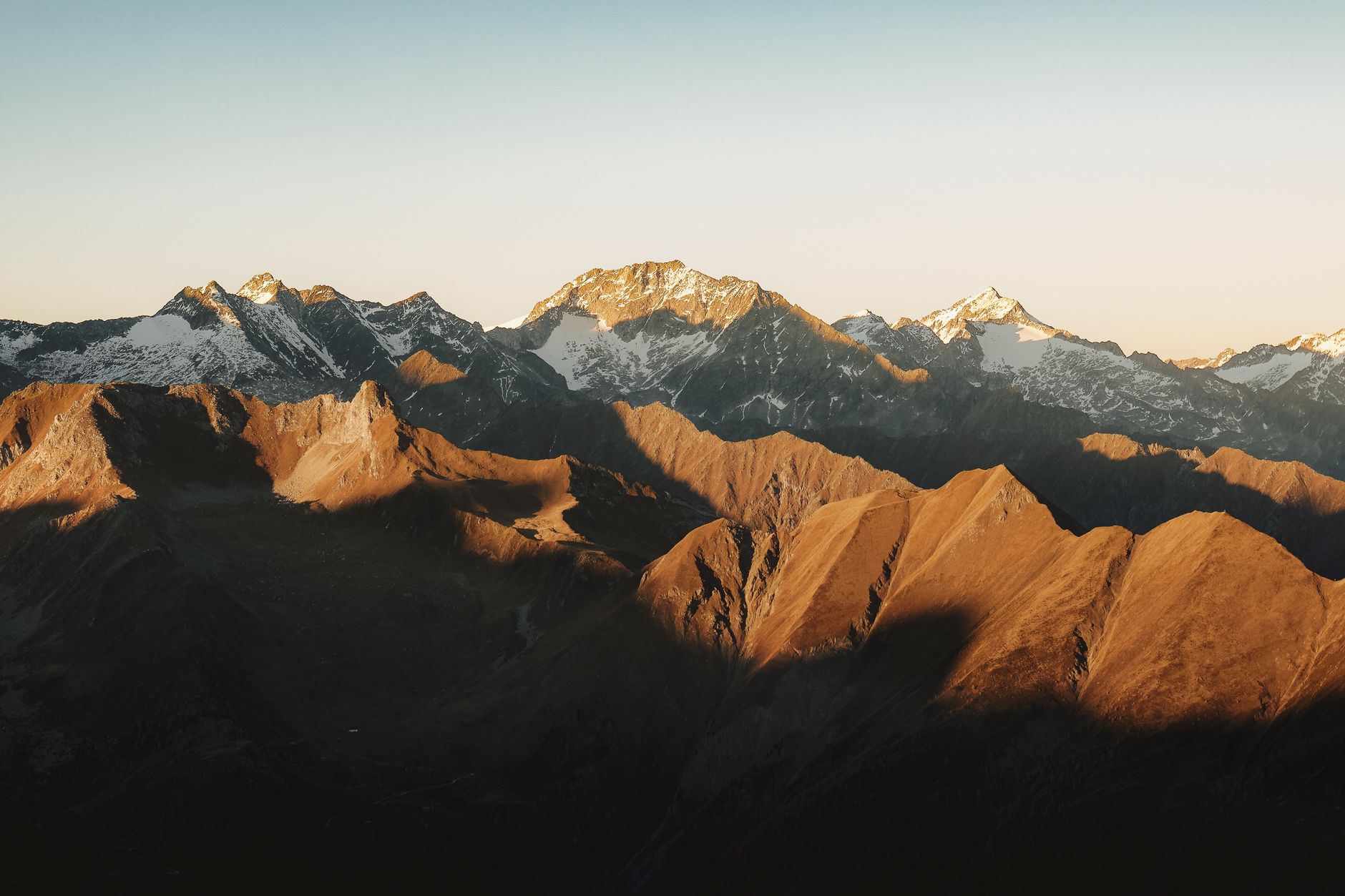Dolomite mountain range under early sunlight